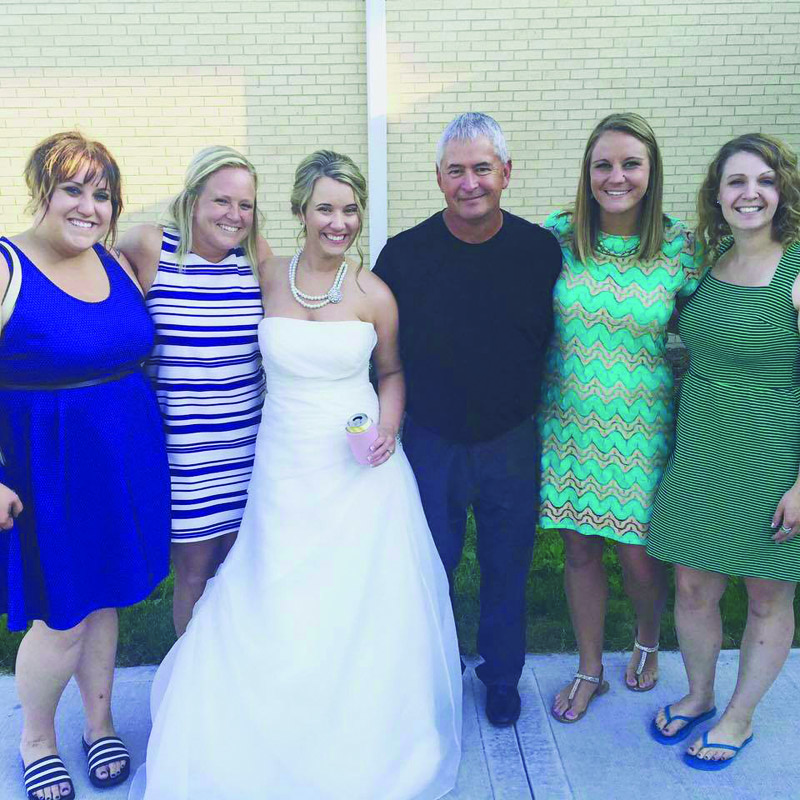  '10 Amy Bullerman and Ryan Duckers, on June 27, 2015. The new bride is shown with friends, l-r: '08 JoAnn Fluker, '10 Jennifer Staseiwicz, former Newman Softball Coach Steve Harshberger, '13 Katie (Traffas) Barrientos and '12 Anna Scheuffle.