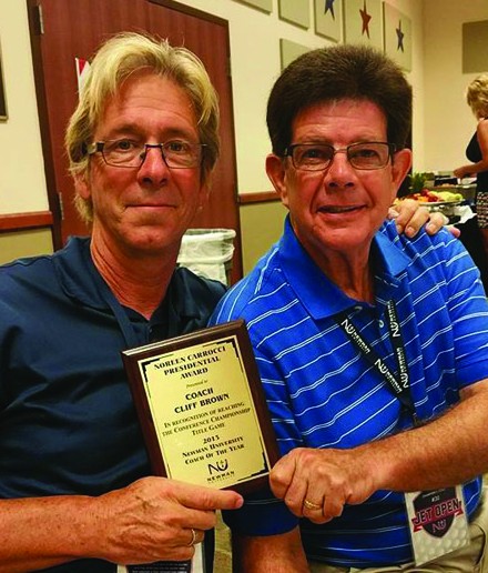 At the Jet Open kick-off party Aug. 1, Head Men's Soccer Coach Cliff Brown, left, received a Noreen Carrocci Presidential Award for reaching the conference championship title game and for being named 2015 NU Coach of the Year. With Brown is Athletics Director Vic Trilli.