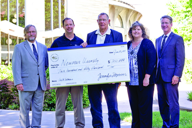 Representatives of Newman University and the Goebel Family Star Lumber Charitable Foundation met on the Newman campus June 25 to celebrate the foundation’s $250,000 gift. Pictured l-r: Newman Professor of Chemistry David Shubert, Ph.D.; Star Lumber Vice President Home Builder & Commercial Sales Dan Goebel; Goebel Family Star Lumber Charitable Foundation Board Member Bob Goebel; Star Lumber Treasurer and Foundation Trustee Jennifer Stephens, and Newman Vice President for University Advancement J.V. Johnston.