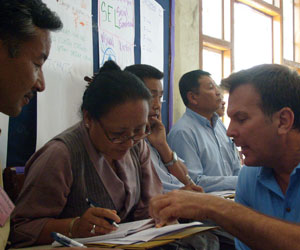Ted Anders, Ph.D., works with teachers at the Tibetan Children's Village in India