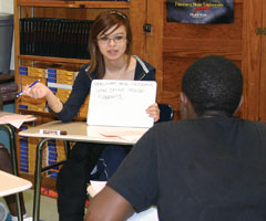 Students participating in a Newman partnership program