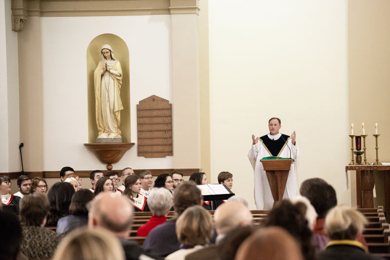 Father John Fogliasso leads Mass during Heritage month.