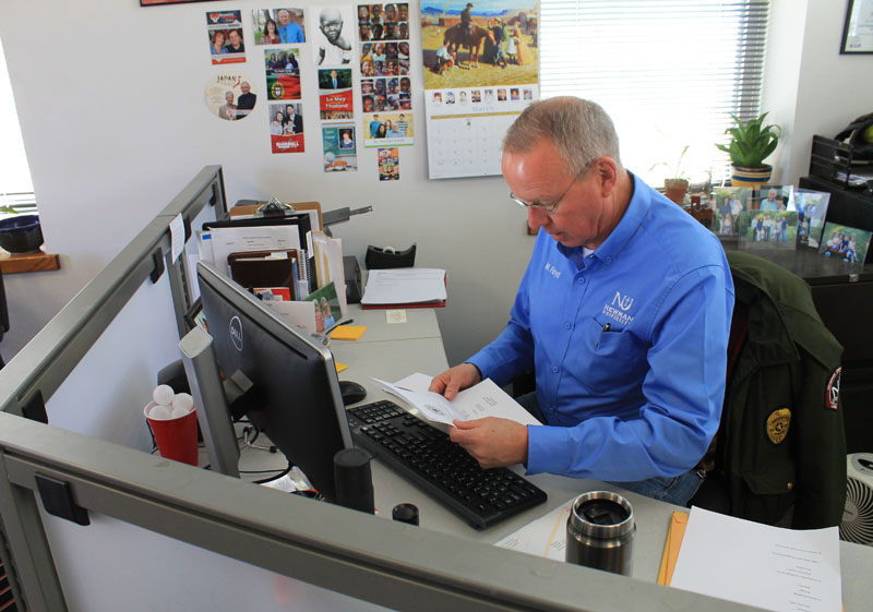 Mo Floyd working in his office.