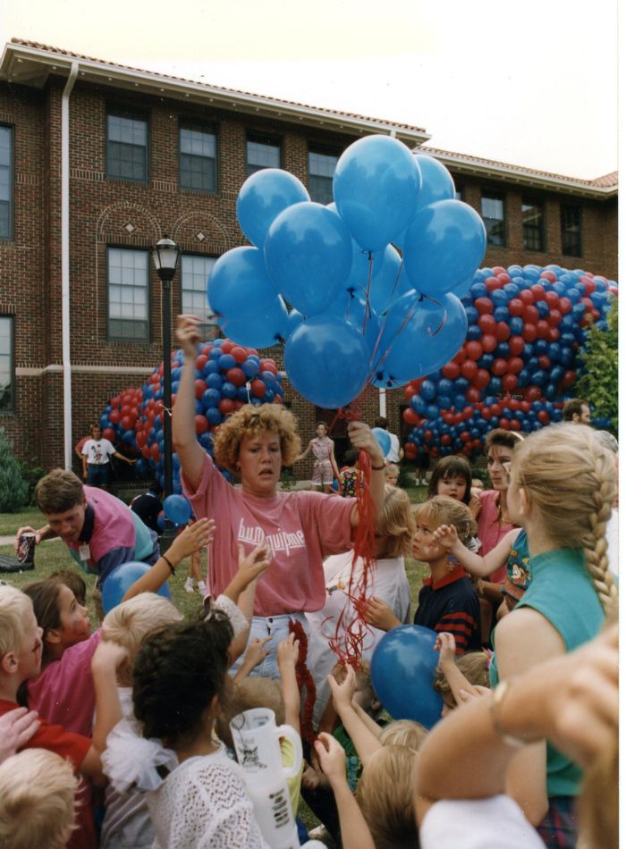1993 - Hundreds attended Kansas Newman's Sixtieth Birthday party, where more than 5,000 balloons were launched to celebrate the college's graduates.