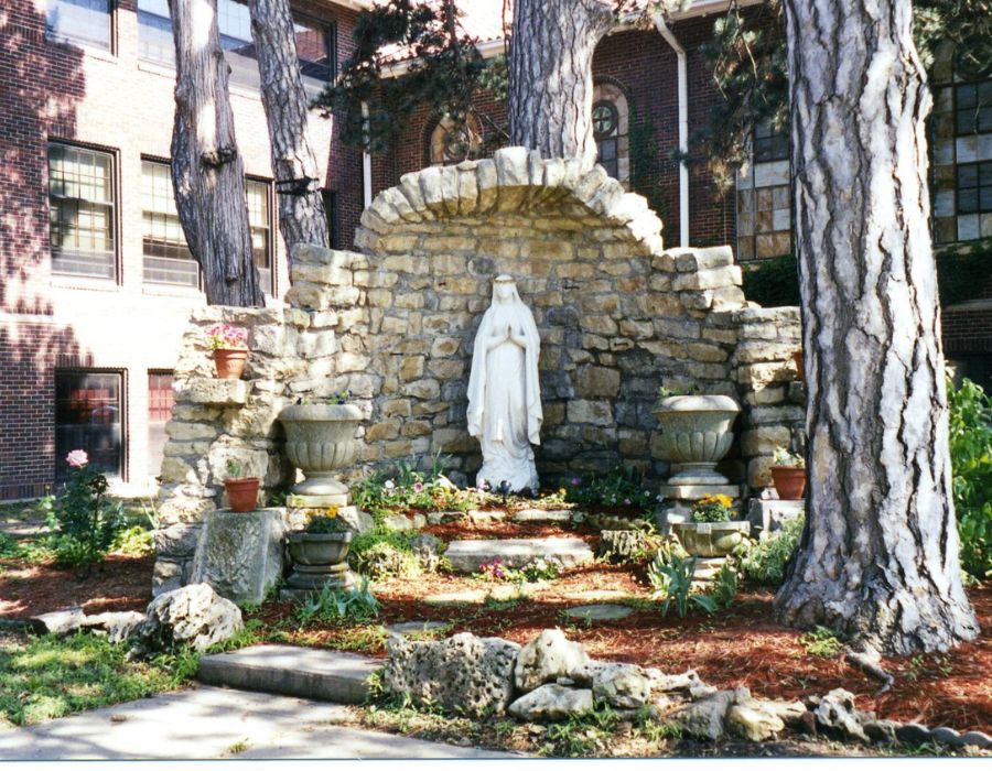 Our Lady's Grotto is located next to Sacred Heart Hall.