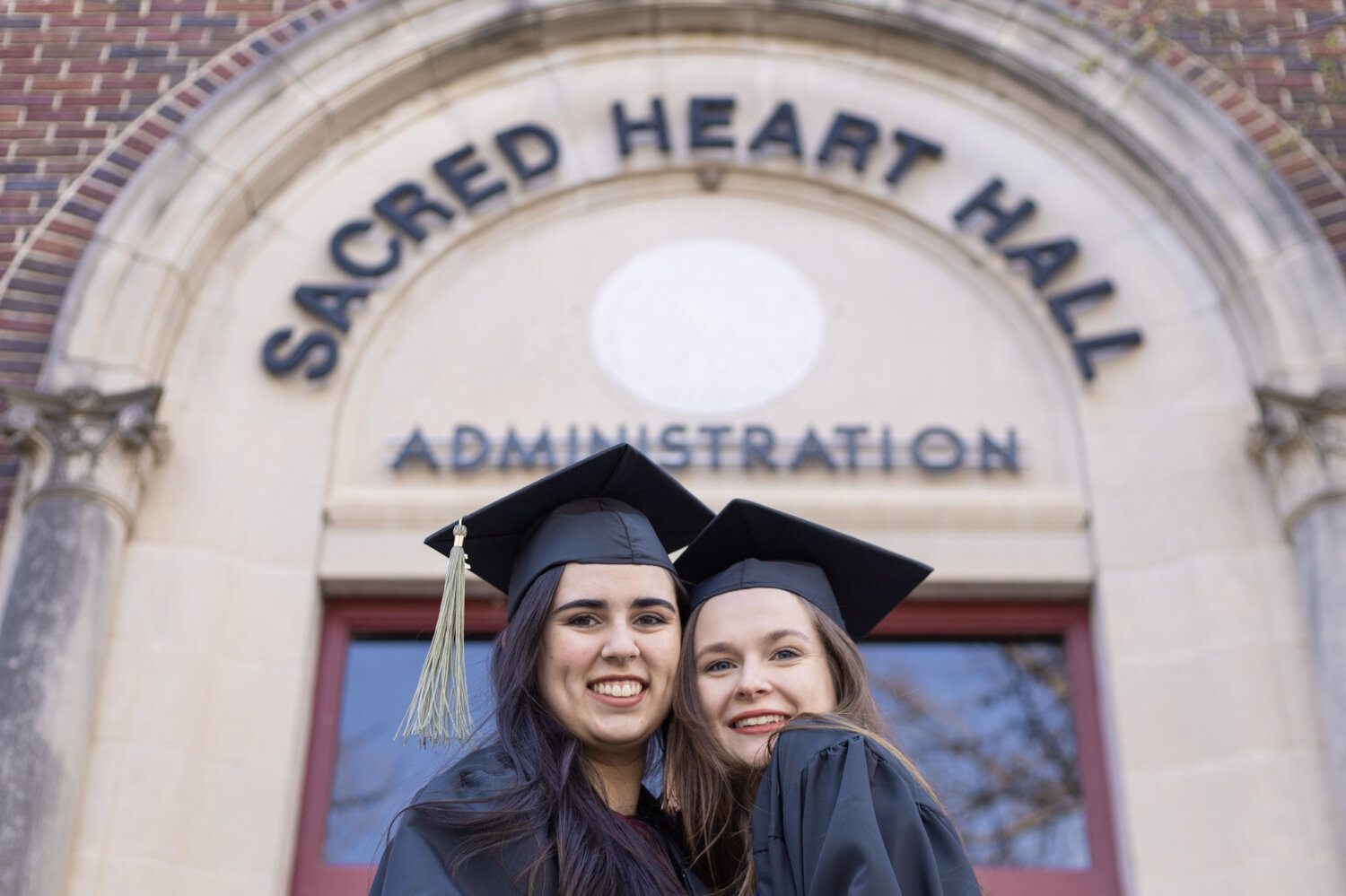 Michele's daughter Kayla (Garvert) Creed (right) graduated from Newman University in 2022.