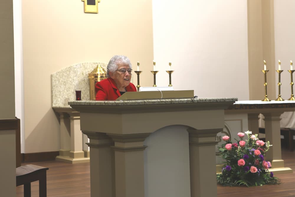 Sister Tarcisia Roths, ASC, gives a reflection during the centennial celebration in St. John's Chapel.