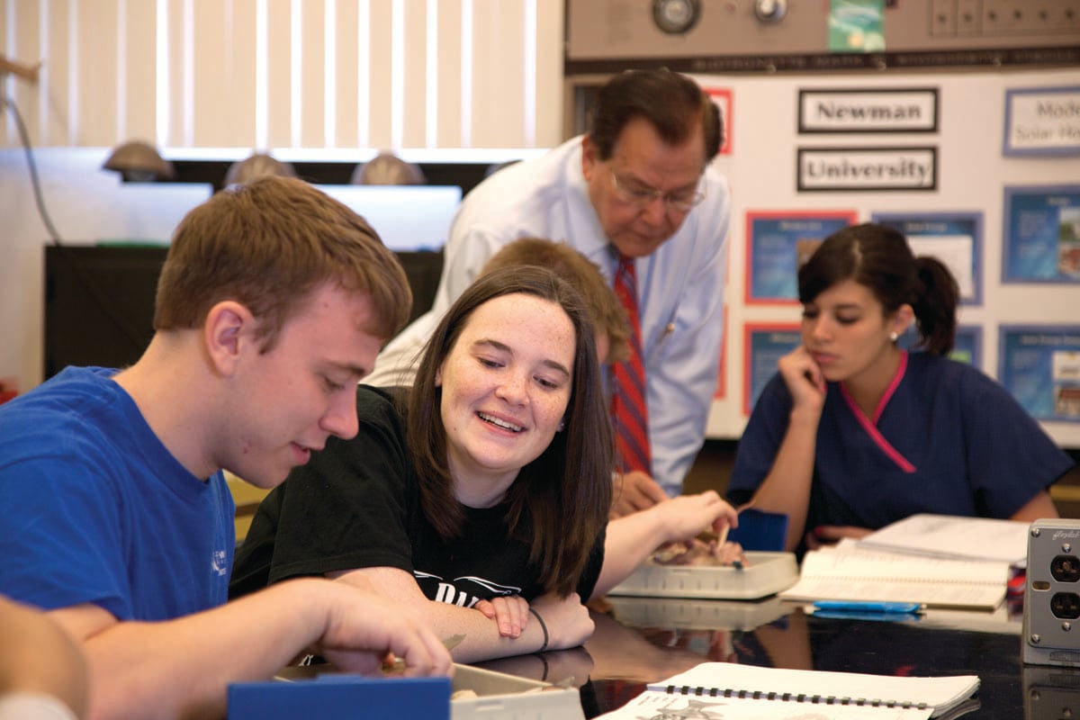 Singh instructs a class at Newman University.