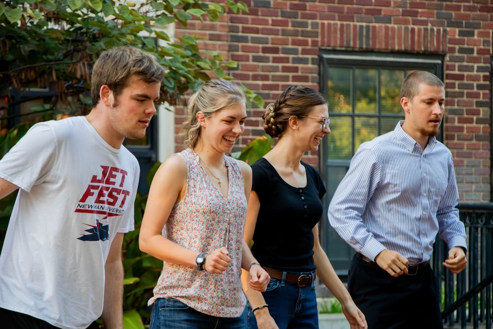 Students dance during a swing dance event by Campus Ministry.