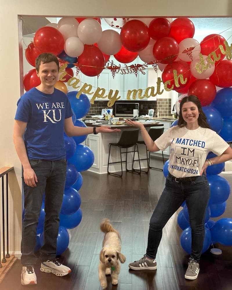 Zayat and her husband celebrate her match day with KU.