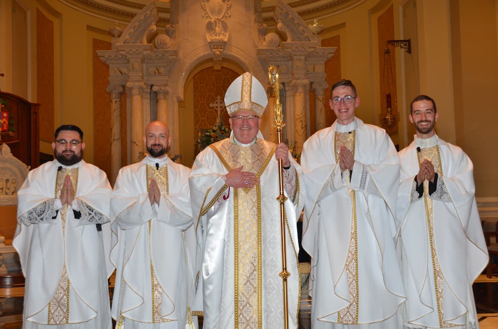 Bishop Carl A. Kemme ordained three men to the transitional diaconate Thursday, May 23, in the Cathedral of the Immaculate Conception in Wichita. From left, are the Rev. Mssrs. Grant Husslig, Joseph Mick, and Nicholas Samsel. (Advance photo)