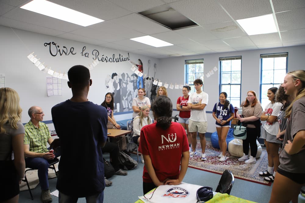 Students of the Honors Program fill the Newman University Honors Lounge located in Sacred Heart Hall.