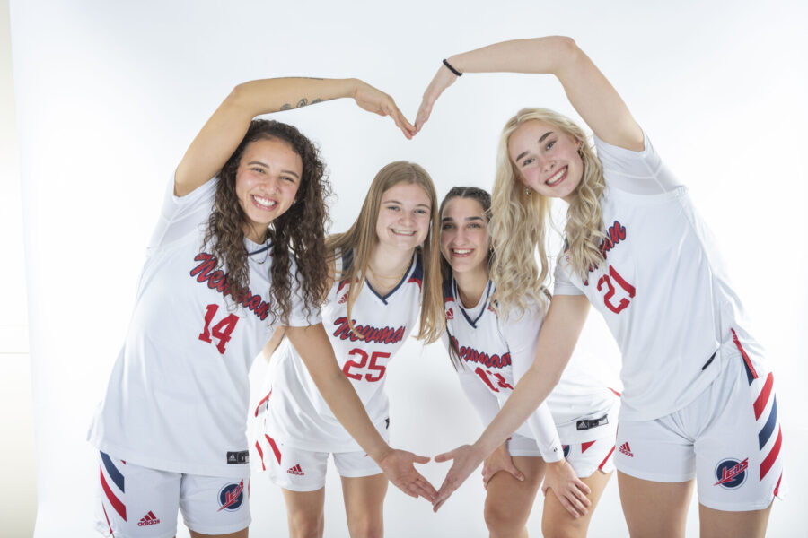 Perez (left), with teammates Brooke Burcham, Monica Redondo and Valeriya Lioukina (right)
