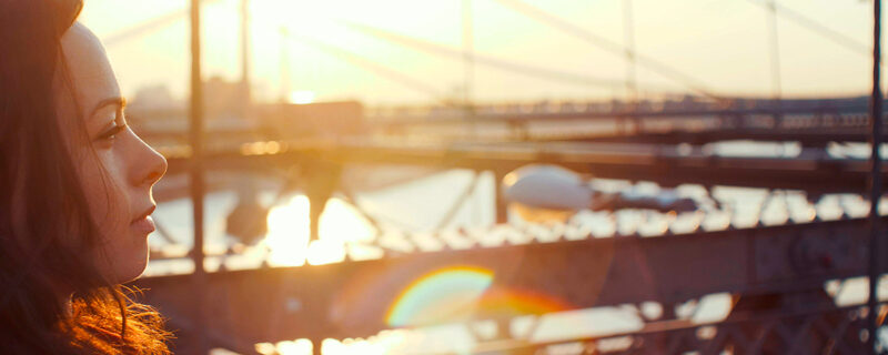 A young woman looking into the distance.